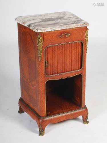 A late 19th century French mahogany and gilt metal mounted bedside cabinet in the manner of Francois