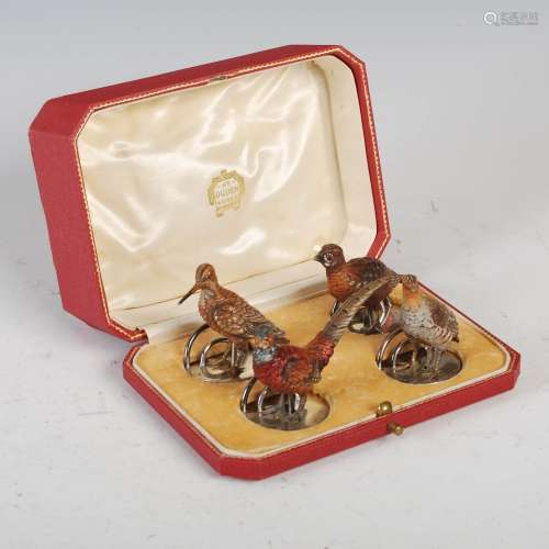 A cased set of four early 20th century cold painted bronze menu card holders in the form of game