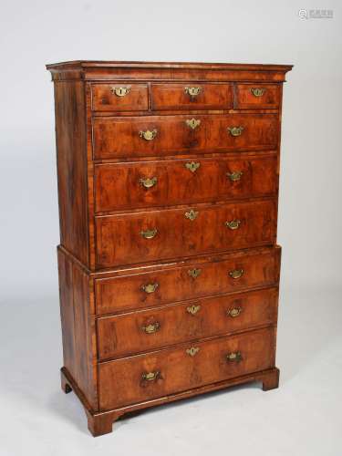 An 18th century walnut chest on chest, the moulded cornice above three short and three long