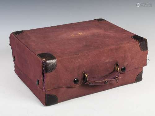 An early 20th century purple leather simulated crocodile skin vanity case, with silver mounted