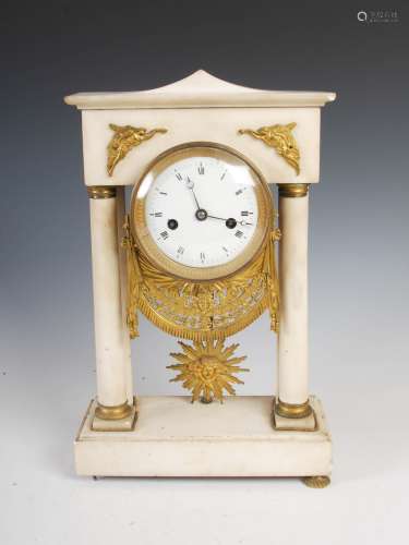 A 19th century Empire marble and gilt metal mantel clock, the circular convex dial with Roman