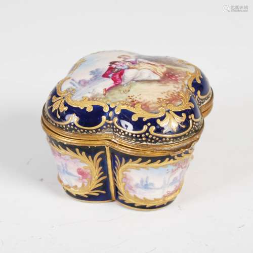 A 19th century Sevres porcelain gilt metal mounted quatrefoil form box, the shaped hinged cover
