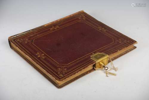 A mid 19th century red and gilt tooled leather album with Bramah, 124 Piccadilly, patent lock,