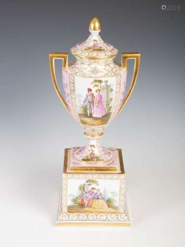 A late 19th/early 20th century Dresden porcelain twin handled urn and cover, decorated with courting