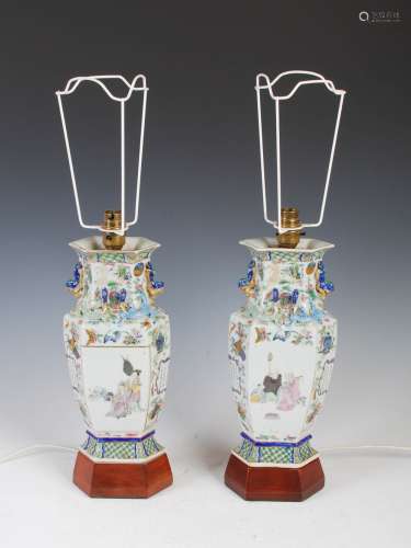 A pair of Chinese porcelain famille rose hexagonal shaped vases later mounted as table lamps, Qing