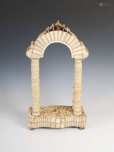 A 19th century prisoner of war carved wood and bone decorated four pillar arch, with bagpipes and