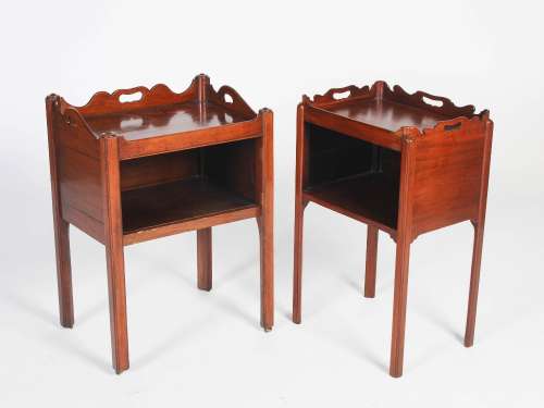 A matched pair of adapted George III mahogany tray top commodes, each with a rectangular top and