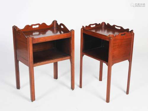 A matched pair of adapted George III mahogany tray top commodes, each with a rectangular top and