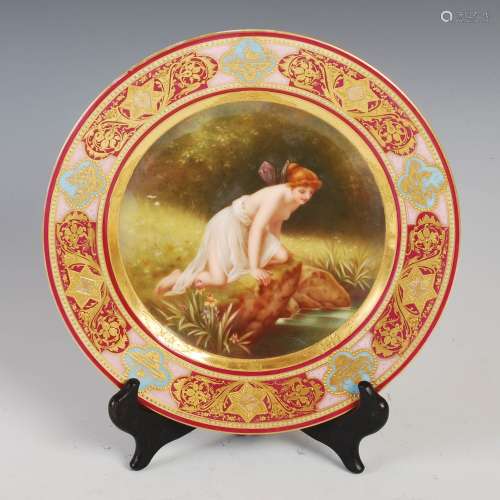 A late 19th/early 20th century hand painted Vienna porcelain cabinet plate, decorated with a named