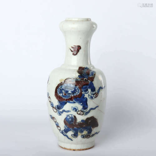 Blue and white glazed garlic bottle with red lion pattern