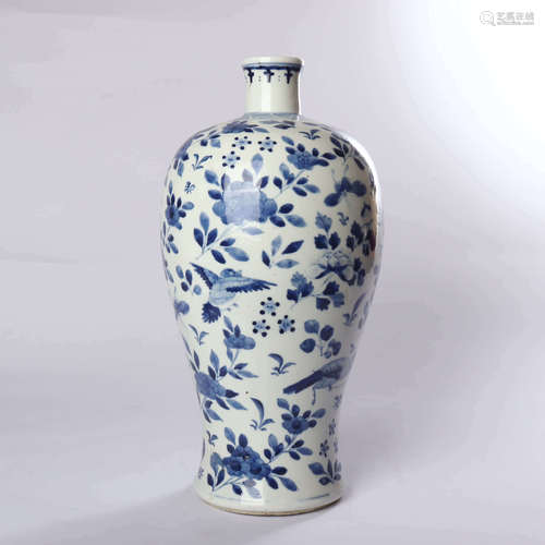 Plum vase decorated with blue and white flowers and birds in early Qing Dynasty