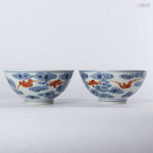 A pair of blue and white alum and red cloud bat bowls made in Guangxu of Qing Dynasty