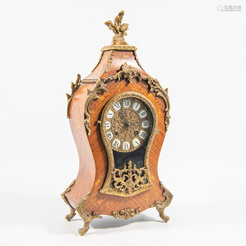 Table clock, bronze with marquetry.