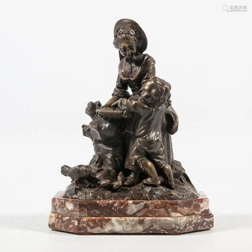 Bronze statue of lady and Child, not marked.