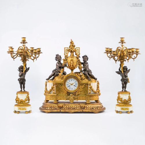 Exceptional Clockset with putti and large candelabra