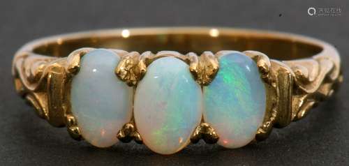 9ct gold and opalescent three-stone ring, featuring three oval cabochon opalescents, individually