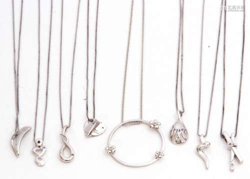 Mixed Lot: eight modern white metal pendant necklaces, each highlighted with a single cut diamond(