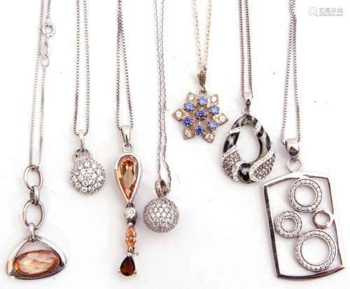 Mixed Lot: seven various white metal stamped pendant/necklaces, paste set (7)