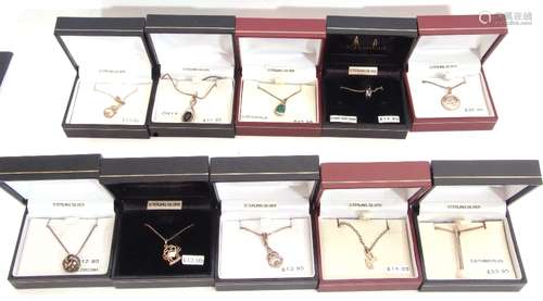 Mixed Lot: ten white metal pendant/necklaces to include onyx, cultured pearl, cubic zirconia