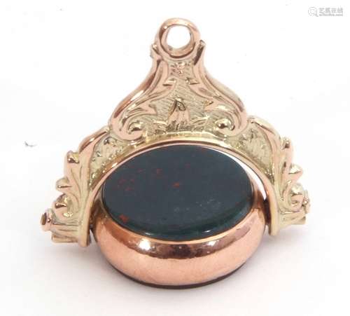 Victorian 9ct gold swivel fob with bloodstone and carnelian sides, framed in a scroll mount