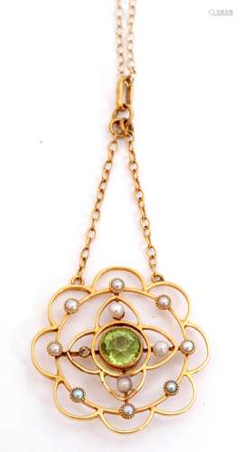 9ct stamped open work pendant and chain, circular scroll shape with central round peridot, bezel set