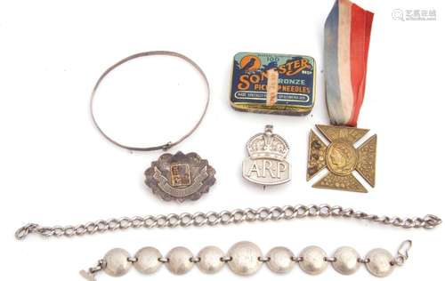 Mixed Lot: Silver Jubilee brooch, Birmingham 1911, a silver ARP badge, London 1939, a Victorian 60th