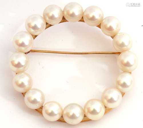 Large cultured pearl brooch featuring 16 cultured pearls set into petal edged cups, all in a garland