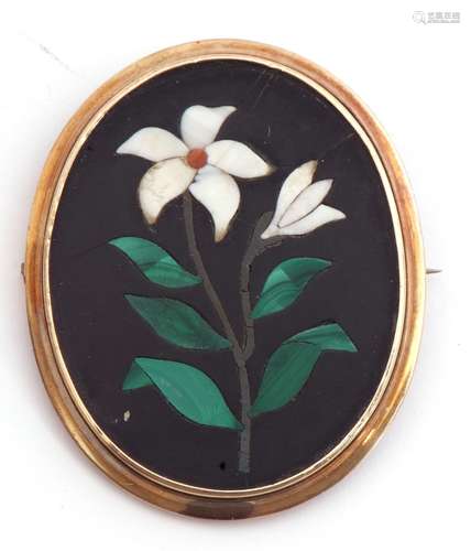 Antique pietra dura brooch of oval form, the centre with an open and closed flowerhead and green