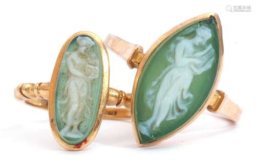 Two glass cameo rings, a green and white glass cameo depicting a lady holding a baby, each in a