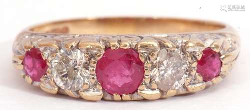 9ct gold ruby and diamond ring, having three round cut graduated rubies and two brilliant cut