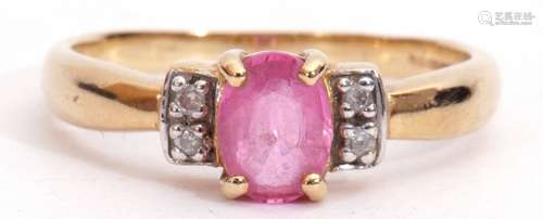 18ct gold pink tourmaline and diamond ring, the oval faceted shaped tourmaline four claw set and