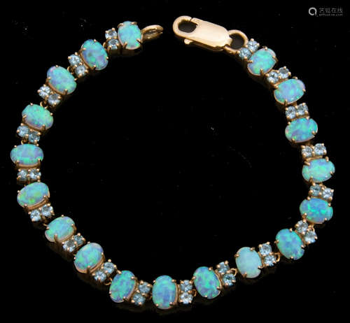 Modern 375 stamped opalescent and blue stone set articulated bracelet