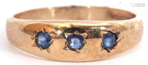 9ct gold sapphire three stone ring, the plain polished design featuring 3 round cut sapphires,