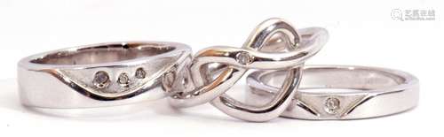 Three white metal and diamond set rings each stamped 925 and highlighted with small single cut