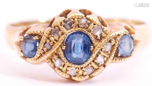 Edwardian 18ct gold sapphire and diamond ring, the prinicipal sapphire 4.4mm x 3.7mm, pale blue