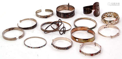 Mixed Lot: silver and enamel bangle, Birmingham 1923, three white metal bracelets, stone and