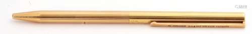 Vintage S T Dupont Paris gold plated pen, a revolving mechanism with textured engine turned link