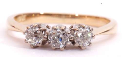 Three stone diamond ring featuring three old cut round diamonds, 0.45ct approx, individually claw