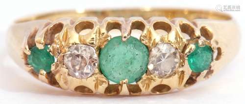 Antique emerald and diamond ring with three graduated round cut emeralds and two round old cut