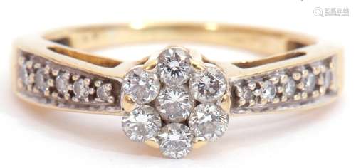 Diamond cluster ring, a design featuring a brilliant cut diamond cluster, raised above diamond set