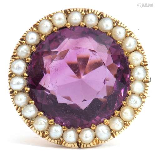 Large amethyst and seed pearl dress ring, the round cut amethyst, 14mm diam, set within a surround