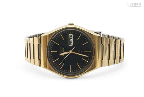 Last quarter of 20th century Gents gold plated Seiko evening watch with quartz day and date