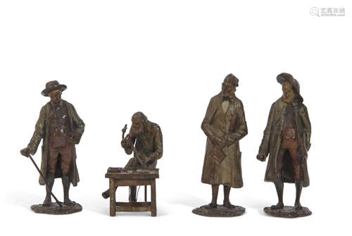 Group of four early 20th century Austrian miniature bronze figures including one of a teacher type