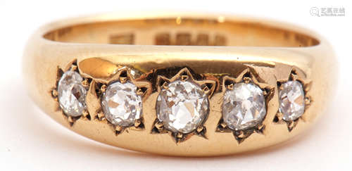 18ct gold five stone diamond ring with five graduated old cut diamonds, each individually in a