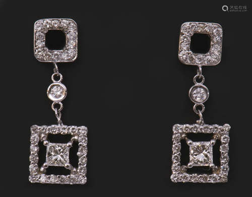 Pair of diamond cluster pendant earrings, each set with a Princess cut diamond, 0.86ct total, colour