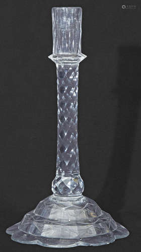 Late 18th/early 19th century facet cut taper stick with slender nozzle above an octagonal mount, the