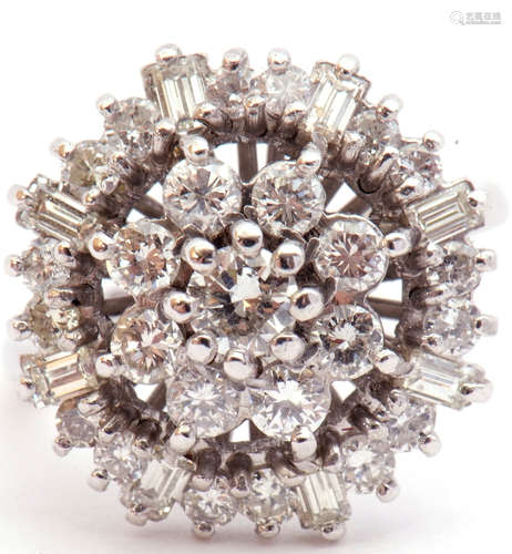 18ct white gold and diamond cluster ring, the pierced panel with a brilliant cut diamond flower head