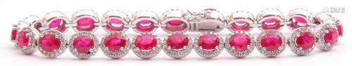 Ruby and diamond set line bracelet featuring 24 oval faceted rubies, each raised within a small