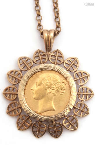 Victorian gold shield back sovereign within a hallmarked 9ct gold filigree leaf edge design pendant,