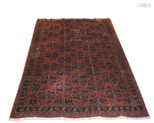 Late 20th century Caucasian carpet, all over geometric lozenge decoration within triple gull border,